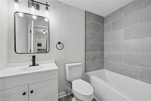 12 Carriage Ln, Newport News, VA 23606 - bathroom featuring toilet, a textured wall, wood finished floors, vanity, and baseboards