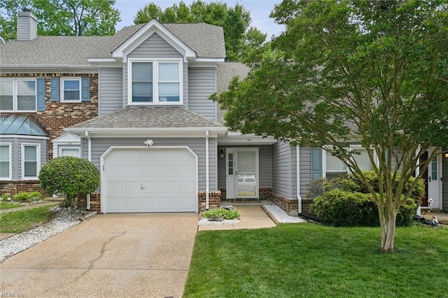 114 Gnarled Oak Ln, Yorktown, VA 23692 - multi unit property with concrete driveway, roof with shingles, a front lawn, a chimney, and brick siding