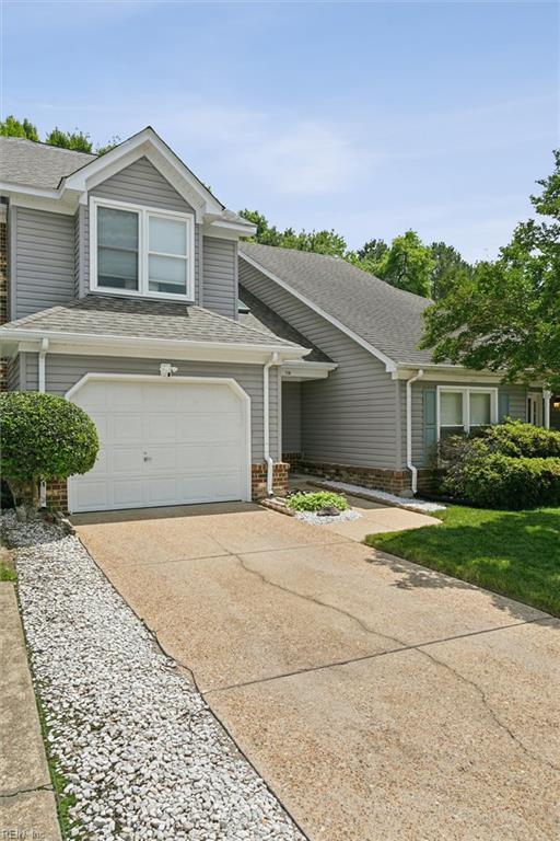 114 Gnarled Oak Ln, Yorktown, VA 23692 - view of front facade featuring concrete driveway, brick siding, an attached garage, and a shingled roof