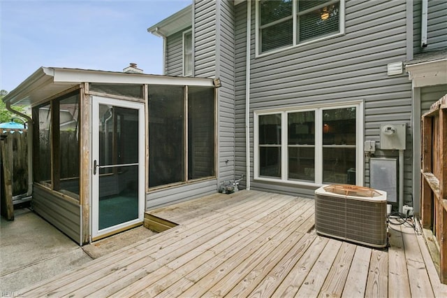 114 Gnarled Oak Ln, Yorktown, VA 23692 - wooden terrace featuring a sunroom and central air condition unit