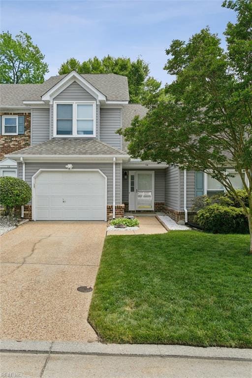 114 Gnarled Oak Ln, Yorktown, VA 23692 - view of front of property with concrete driveway, a front yard, an attached garage, and a shingled roof