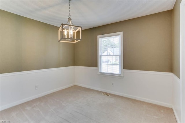 2509 Quail Ridge Ct, Chesapeake, VA 23321 - spare room featuring a chandelier, light carpet, and baseboards