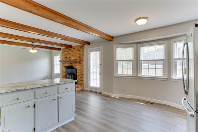 2509 Quail Ridge Ct, Chesapeake, VA 23321 - kitchen featuring beam ceiling, light wood finished floors, freestanding refrigerator, a ceiling fan, and baseboards