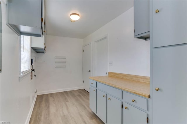 2509 Quail Ridge Ct, Chesapeake, VA 23321 - kitchen with light wood-style flooring, light countertops, and baseboards