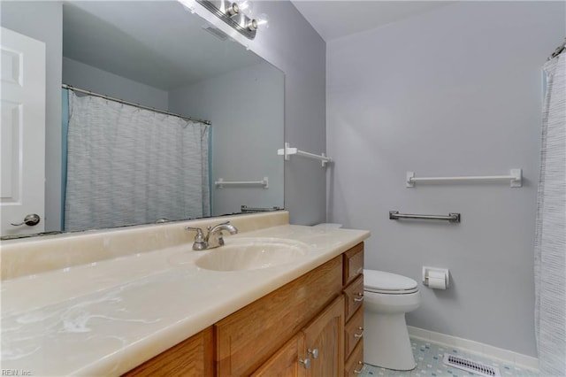 2509 Quail Ridge Ct, Chesapeake, VA 23321 - bathroom featuring baseboards, toilet, and vanity
