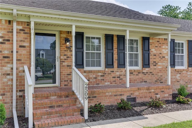 2509 Quail Ridge Ct, Chesapeake, VA 23321 - doorway to property with crawl space, roof with shingles, brick siding, and covered porch