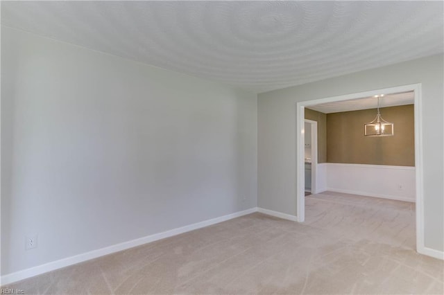 2509 Quail Ridge Ct, Chesapeake, VA 23321 - spare room featuring a chandelier, light carpet, and baseboards