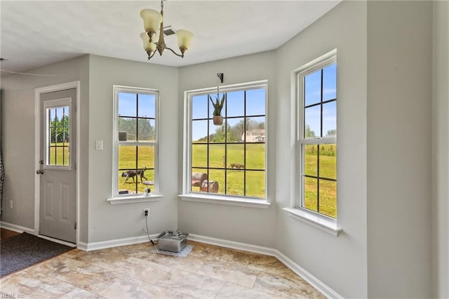 32473 Pebble Brook Dr, Franklin, VA 23851 - entryway with a chandelier, healthy amount of natural light, and baseboards