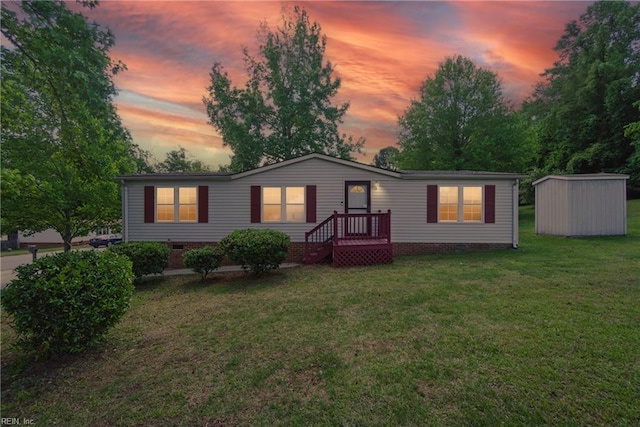 200 Burnetts Way, Suffolk, VA 23434 - manufactured / mobile home featuring a shed, a yard, an outbuilding, and crawl space