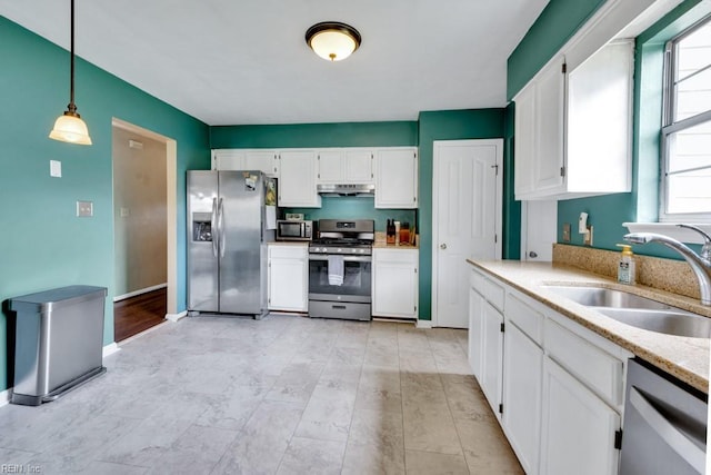 1909 Falling Sun Cir, Virginia Beach, VA 23454 - kitchen with stainless steel appliances, a sink, under cabinet range hood, and plenty of natural light