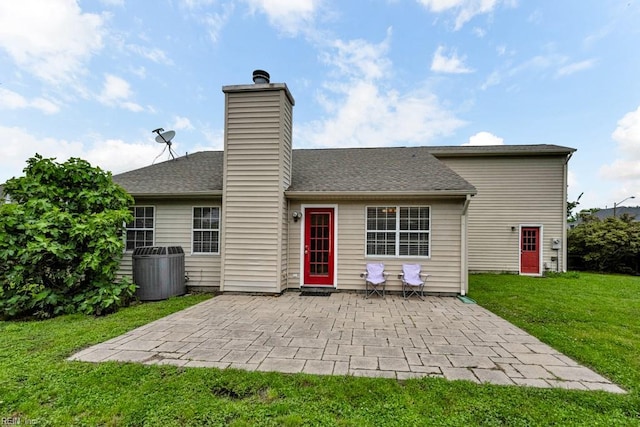 1909 Falling Sun Cir, Virginia Beach, VA 23454 - rear view of house with a patio area, central air condition unit, a yard, a chimney, and a shingled roof
