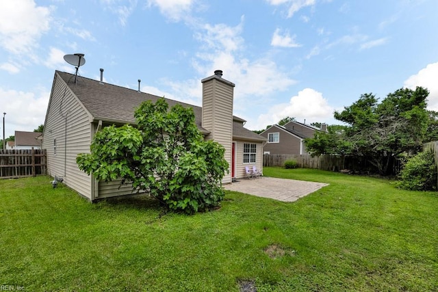 1909 Falling Sun Cir, Virginia Beach, VA 23454 - rear view of house featuring a patio area, a chimney, and roof with shingles