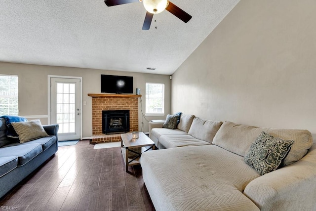 1909 Falling Sun Cir, Virginia Beach, VA 23454 - living area with healthy amount of natural light, a textured ceiling, a ceiling fan, wood finished floors, and a fireplace