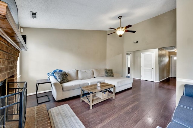 1909 Falling Sun Cir, Virginia Beach, VA 23454 - living area with a ceiling fan, wood finished floors, a fireplace, baseboards, and high vaulted ceiling
