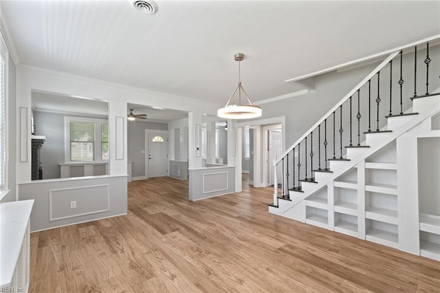 8575 Chesapeake Blvd, Norfolk, VA 23503 - entrance foyer featuring stairway, ornamental molding, wood finished floors, and ceiling fan