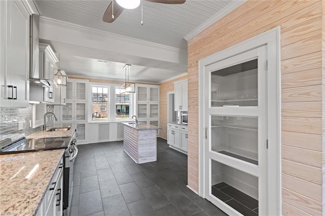 8575 Chesapeake Blvd, Norfolk, VA 23503 - kitchen featuring stainless steel electric range, a sink, ornamental molding, a kitchen island with sink, and ceiling fan