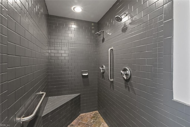 8575 Chesapeake Blvd, Norfolk, VA 23503 - bathroom featuring a tile shower and stone finish floors