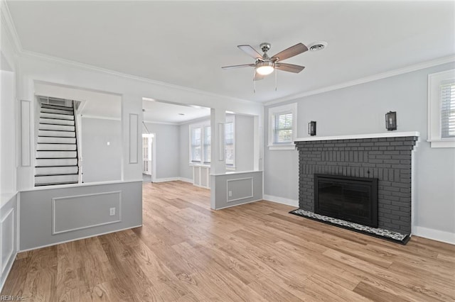8575 Chesapeake Blvd, Norfolk, VA 23503 - unfurnished living room with ceiling fan, ornamental molding, a fireplace, wood finished floors, and stairs