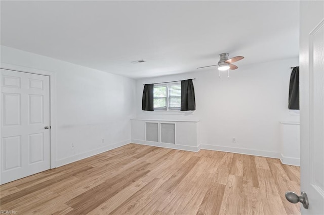 8575 Chesapeake Blvd, Norfolk, VA 23503 - spare room with light wood-style floors, a ceiling fan, and baseboards