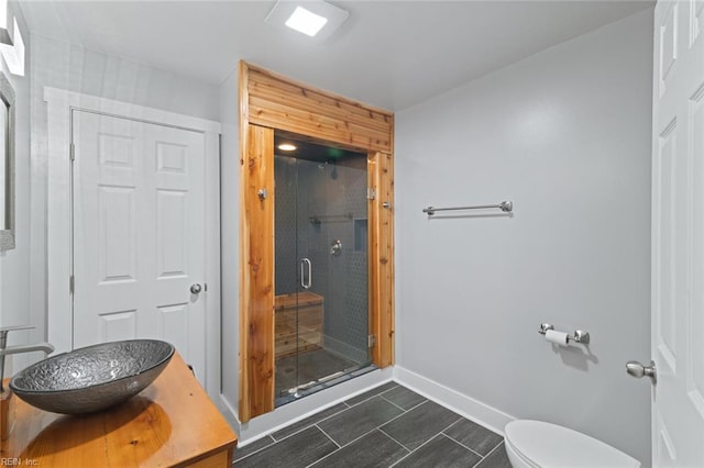 8575 Chesapeake Blvd, Norfolk, VA 23503 - full bathroom with a stall shower, baseboards, toilet, and vanity