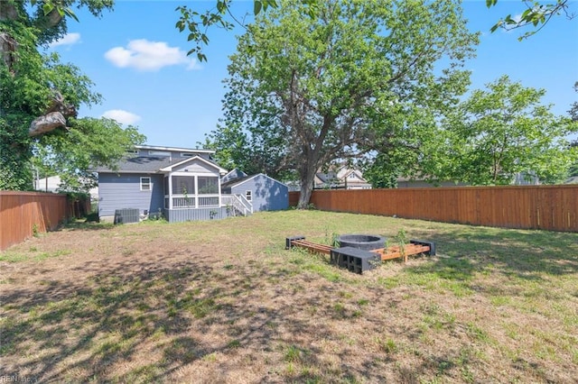 8575 Chesapeake Blvd, Norfolk, VA 23503 - view of yard featuring central AC and a sunroom