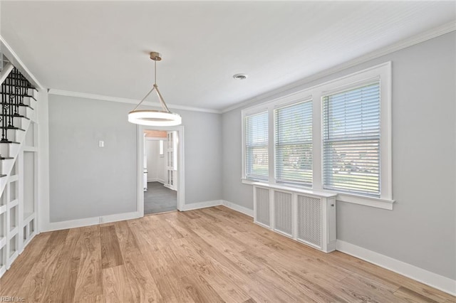 8575 Chesapeake Blvd, Norfolk, VA 23503 - unfurnished dining area with ornamental molding, light wood-style flooring, and baseboards