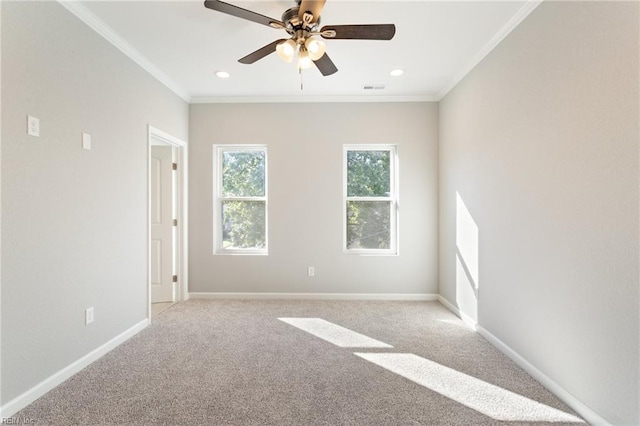 empty room featuring ornamental molding, ceiling fan, light colored carpet, baseboards, and recessed lighting