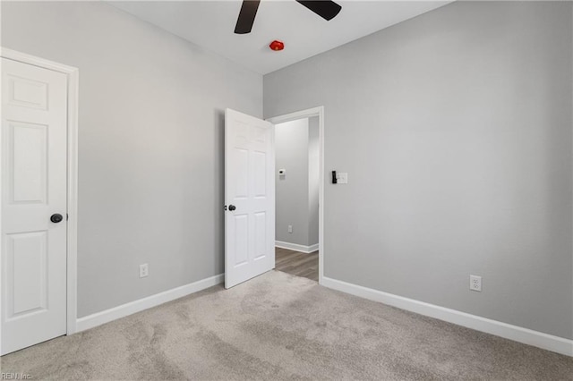 736 A Ave, Norfolk, VA 23504 - unfurnished bedroom featuring carpet floors, baseboards, and a ceiling fan
