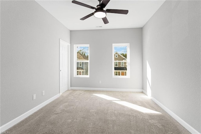 736 A Ave, Norfolk, VA 23504 - unfurnished room featuring light colored carpet, ceiling fan, a textured wall, and baseboards