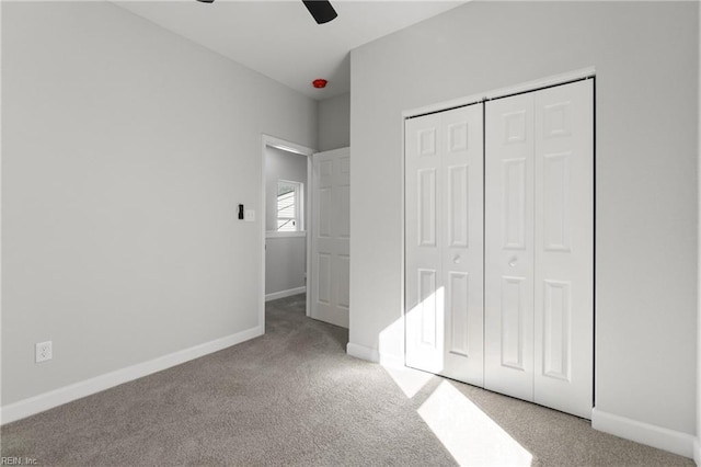 736 A Ave, Norfolk, VA 23504 - unfurnished bedroom with carpet, baseboards, a closet, and a ceiling fan