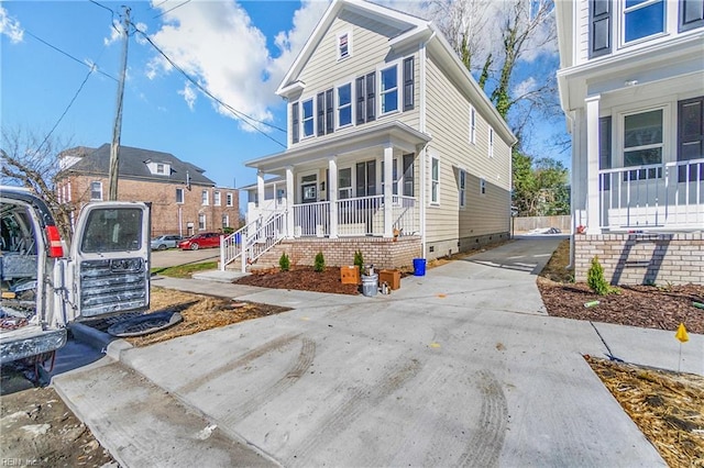 736 A Ave, Norfolk, VA 23504 - view of front of home featuring a porch, crawl space, and concrete driveway