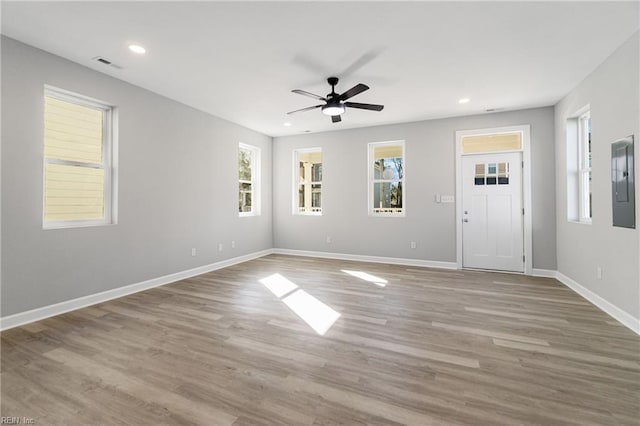 736 A Ave, Norfolk, VA 23504 - unfurnished living room featuring ceiling fan, electric panel, baseboards, recessed lighting, and wood finished floors