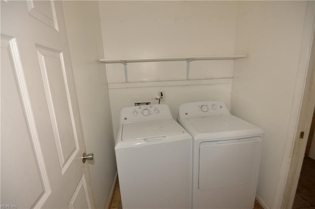 laundry area featuring independent washer and dryer