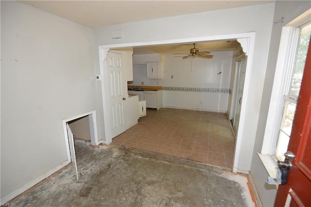 unfurnished living room featuring ceiling fan