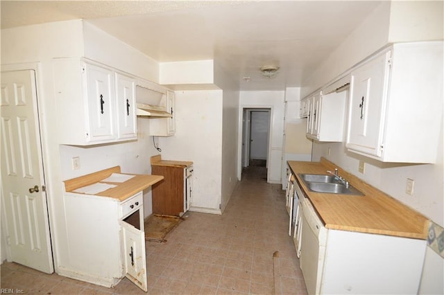kitchen with a sink, white cabinetry, light countertops, and white dishwasher