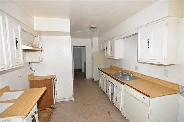 kitchen featuring a sink, white dishwasher, white cabinetry, and light countertops