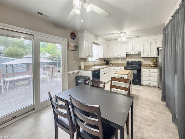 103 Lake St, Chesapeake, VA 23323 - kitchen with black appliances, a sink, ceiling fan, under cabinet range hood, and white cabinets