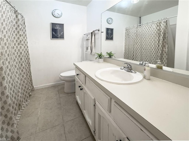 103 Lake St, Chesapeake, VA 23323 - full bath with toilet, tile patterned floors, vanity, baseboards, and a shower with shower curtain