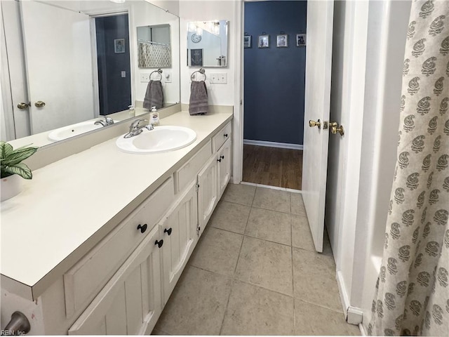 103 Lake St, Chesapeake, VA 23323 - full bath with baseboards, vanity, and tile patterned flooring
