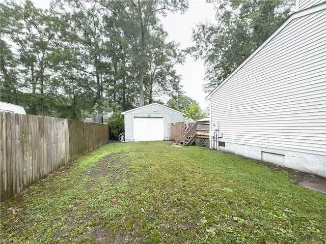 103 Lake St, Chesapeake, VA 23323 - view of yard with a detached garage, an outdoor structure, and stairs