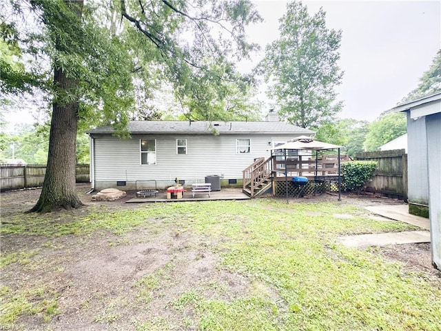 103 Lake St, Chesapeake, VA 23323 - back of house with a deck, a fenced backyard, crawl space, a gazebo, and central air condition unit