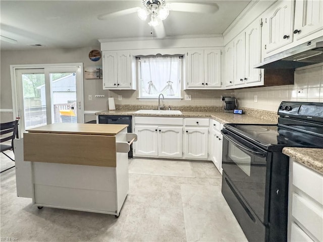 103 Lake St, Chesapeake, VA 23323 - kitchen featuring black range with electric cooktop, a sink, under cabinet range hood, white cabinets, and a ceiling fan
