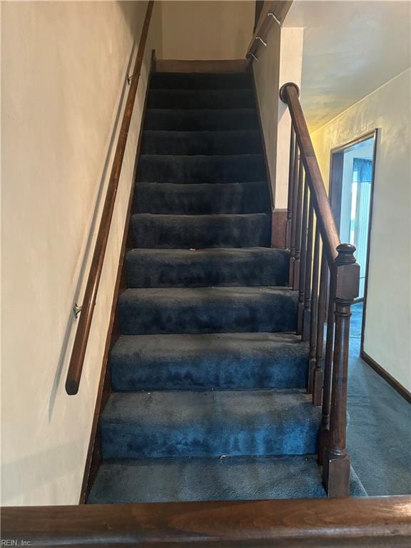 5637 Picadilly Ln, Portsmouth, VA 23703 - staircase featuring carpet floors and baseboards
