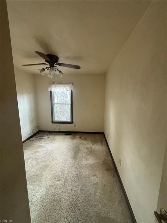 5637 Picadilly Ln, Portsmouth, VA 23703 - spare room with ceiling fan, light colored carpet, and baseboards