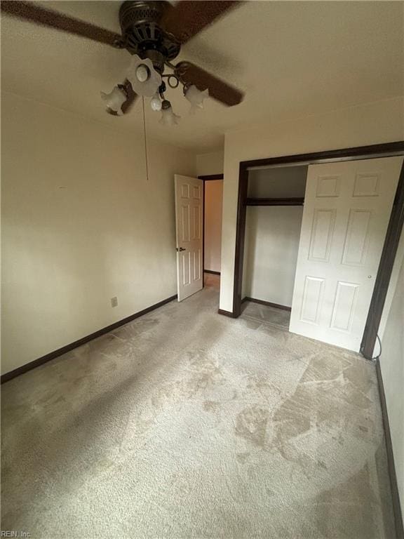 5637 Picadilly Ln, Portsmouth, VA 23703 - unfurnished bedroom featuring light carpet, baseboards, a closet, and ceiling fan