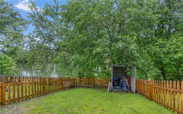 view of yard with a shed and an outdoor structure