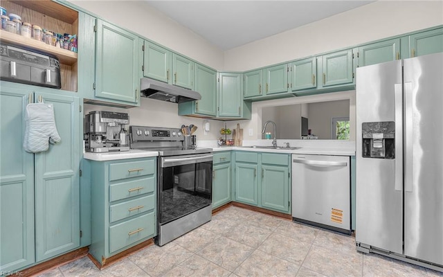 kitchen featuring stainless steel appliances, under cabinet range hood, a sink, light countertops, and open shelves