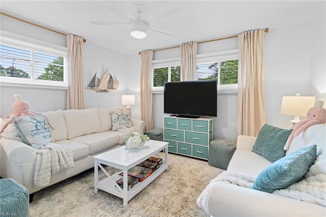 living room featuring a ceiling fan