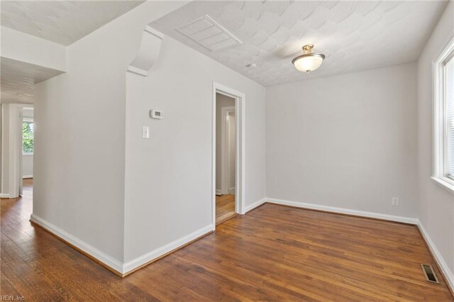 7716 Newport Ave, Norfolk, VA 23505 - empty room with wood-type flooring and baseboards