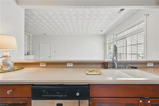 2043 Queens Point Dr, Suffolk, VA 23434 - kitchen with dishwashing machine, a sink, and light countertops